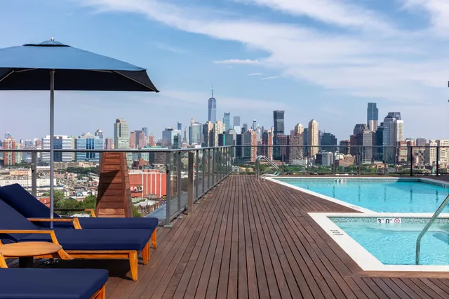 a view of a balcony with an ocean view