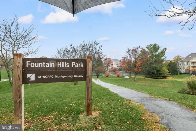a view of a park with welcome board