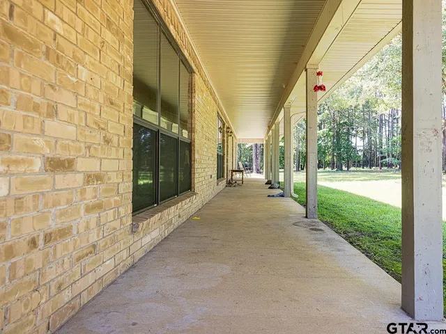 a view of a pathway both side of house