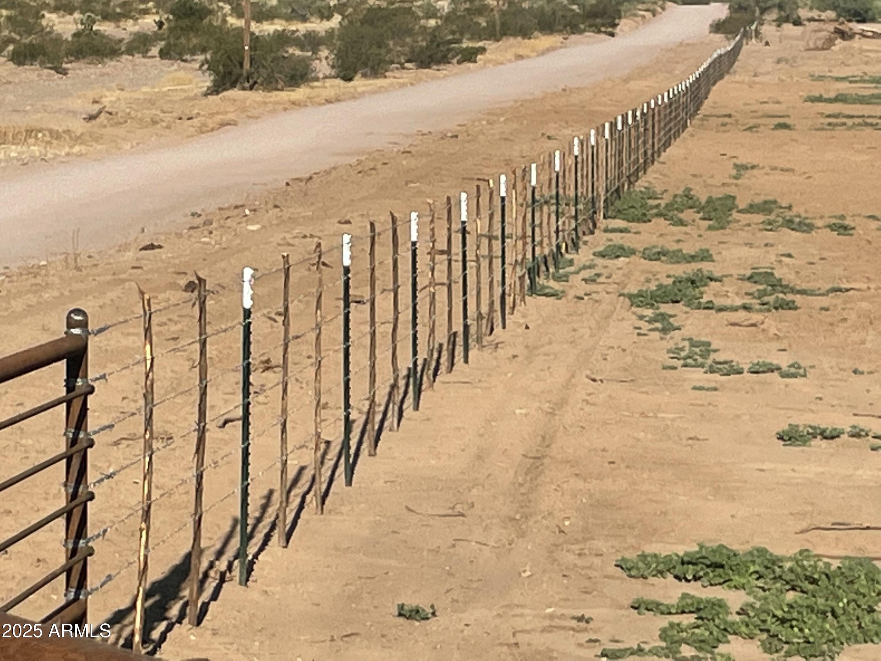 28952 East Price Road Florence, AZ 85132 - Photo 11 of 14 a view of terrace with wooden fence
