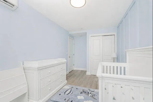 a view of walk in closet with white walls