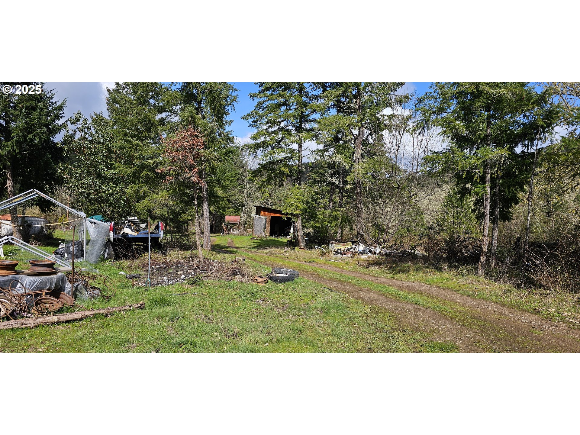 680 Cold Water Ranch Road Riddle, OR 97469 - Photo 8 of 9 a childrens park with lots of trees