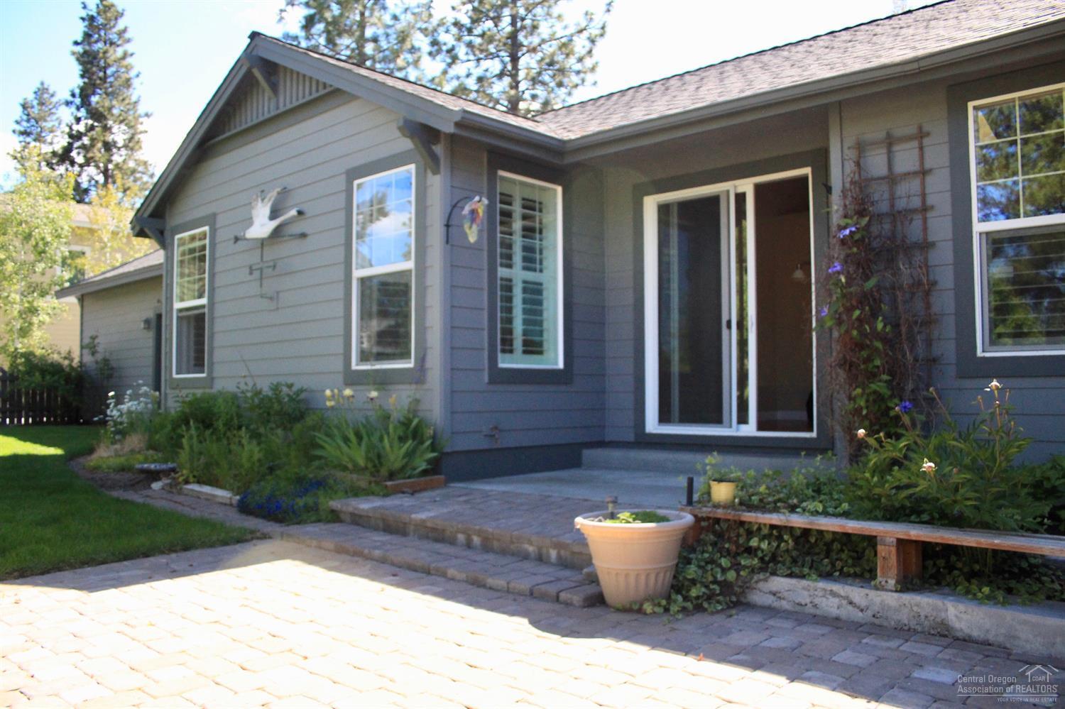 19459 Blue Lake Loop Bend, OR 97702 - Photo 3 of 19 a view of a house with backyard and sitting area