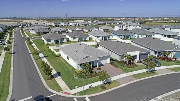 an aerial view of a house with a garden