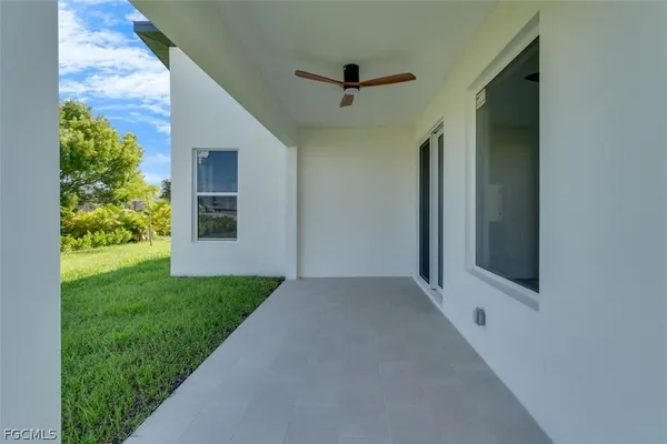 a house with a tree in front of it