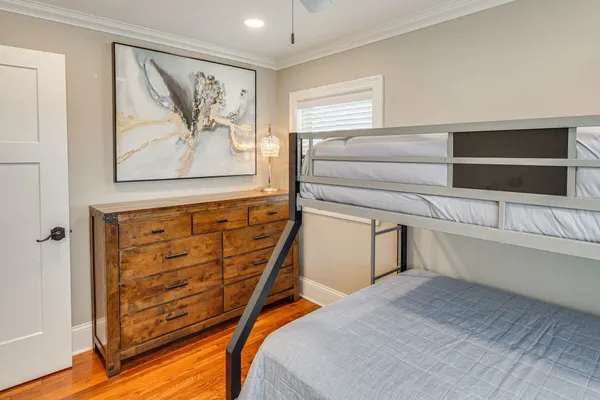 a bedroom with a bed and furniture