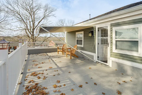a view of a porch with a bench