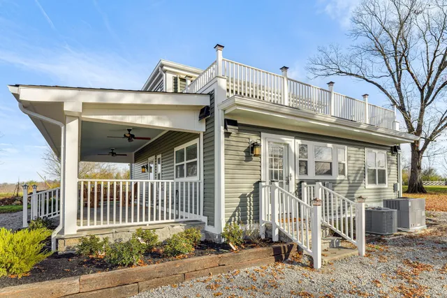 a front view of a house with a porch