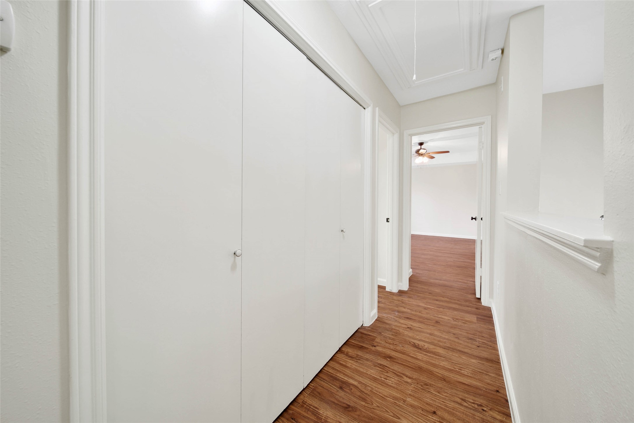 1427 Redwood Village Circle Spring, TX 77386 - Photo 26 of 43 a view of a hallway with wooden floor