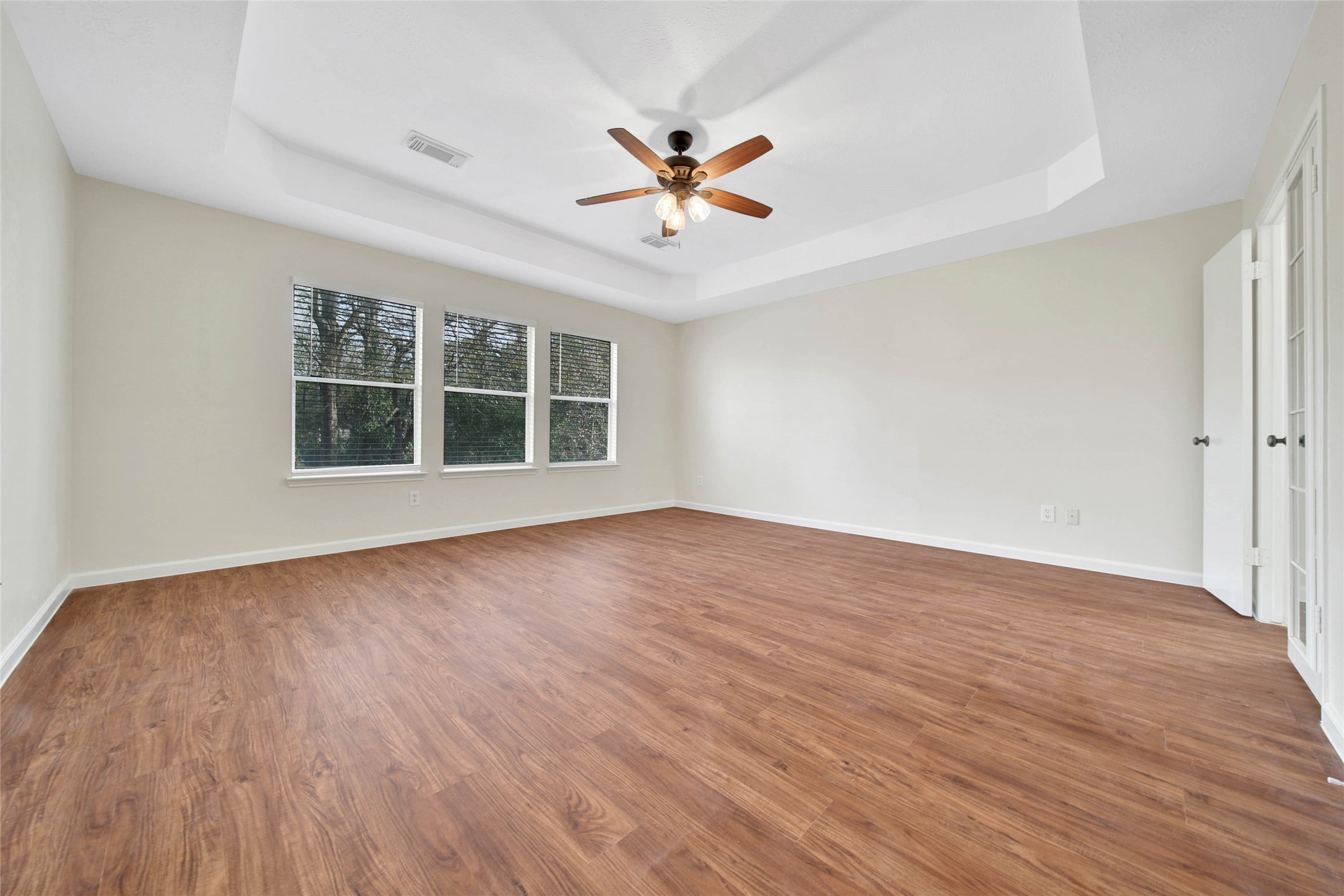 1427 Redwood Village Circle Spring, TX 77386 - Photo 30 of 43 wooden floor in an empty room with a window