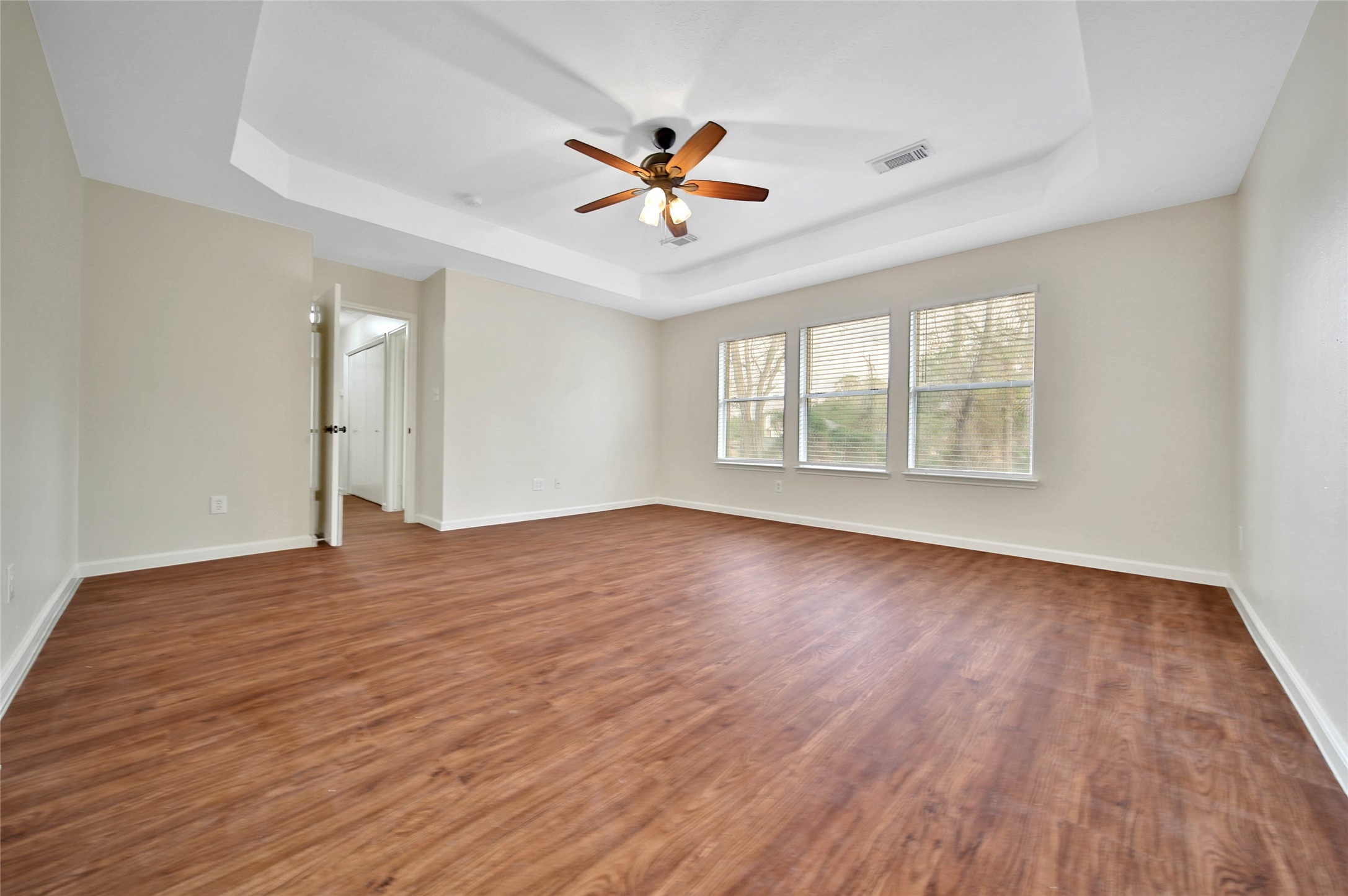 1427 Redwood Village Circle Spring, TX 77386 - Photo 33 of 43 wooden floor in an empty room with a window