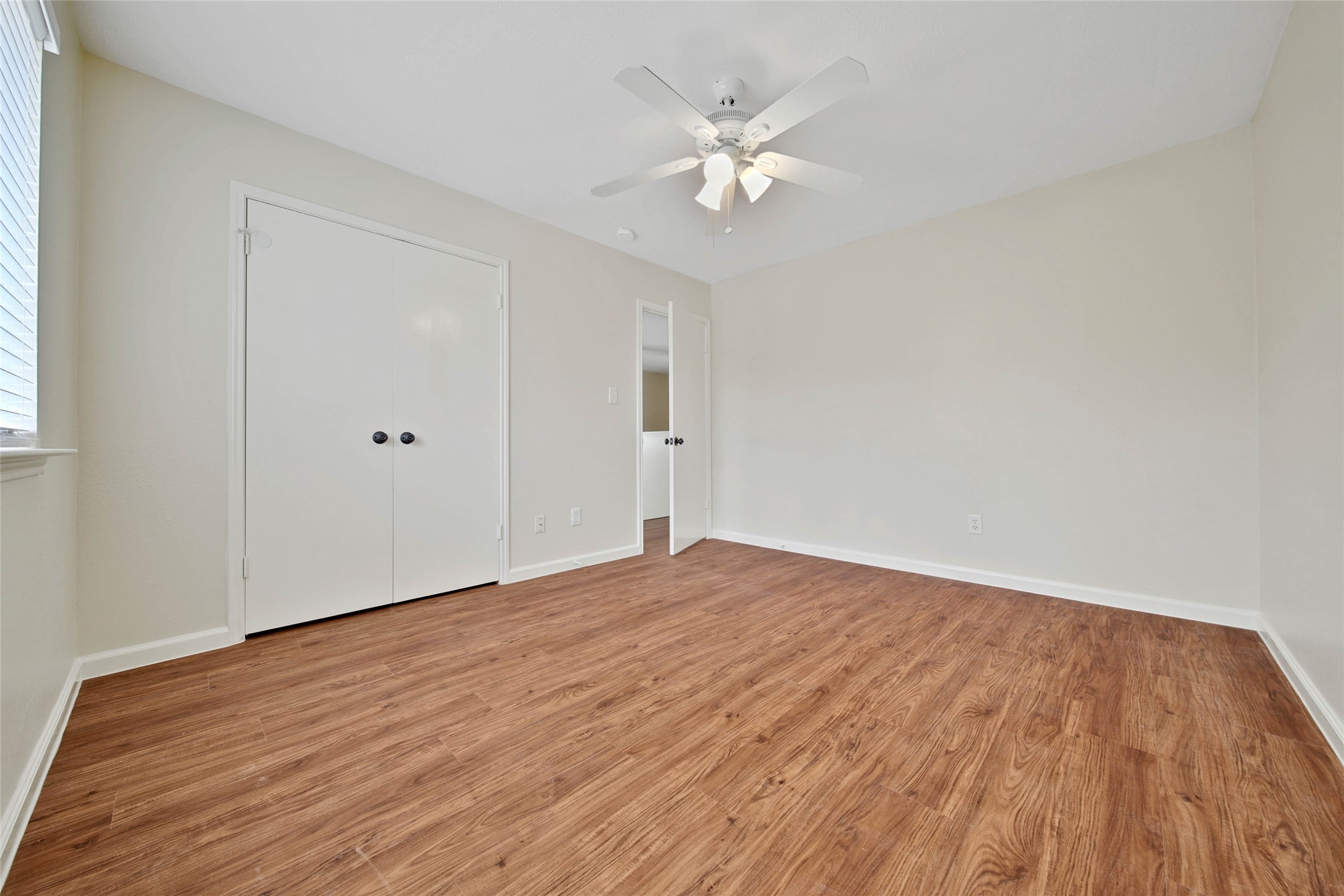 1427 Redwood Village Circle Spring, TX 77386 - Photo 38 of 43 a view of empty room with wooden floor