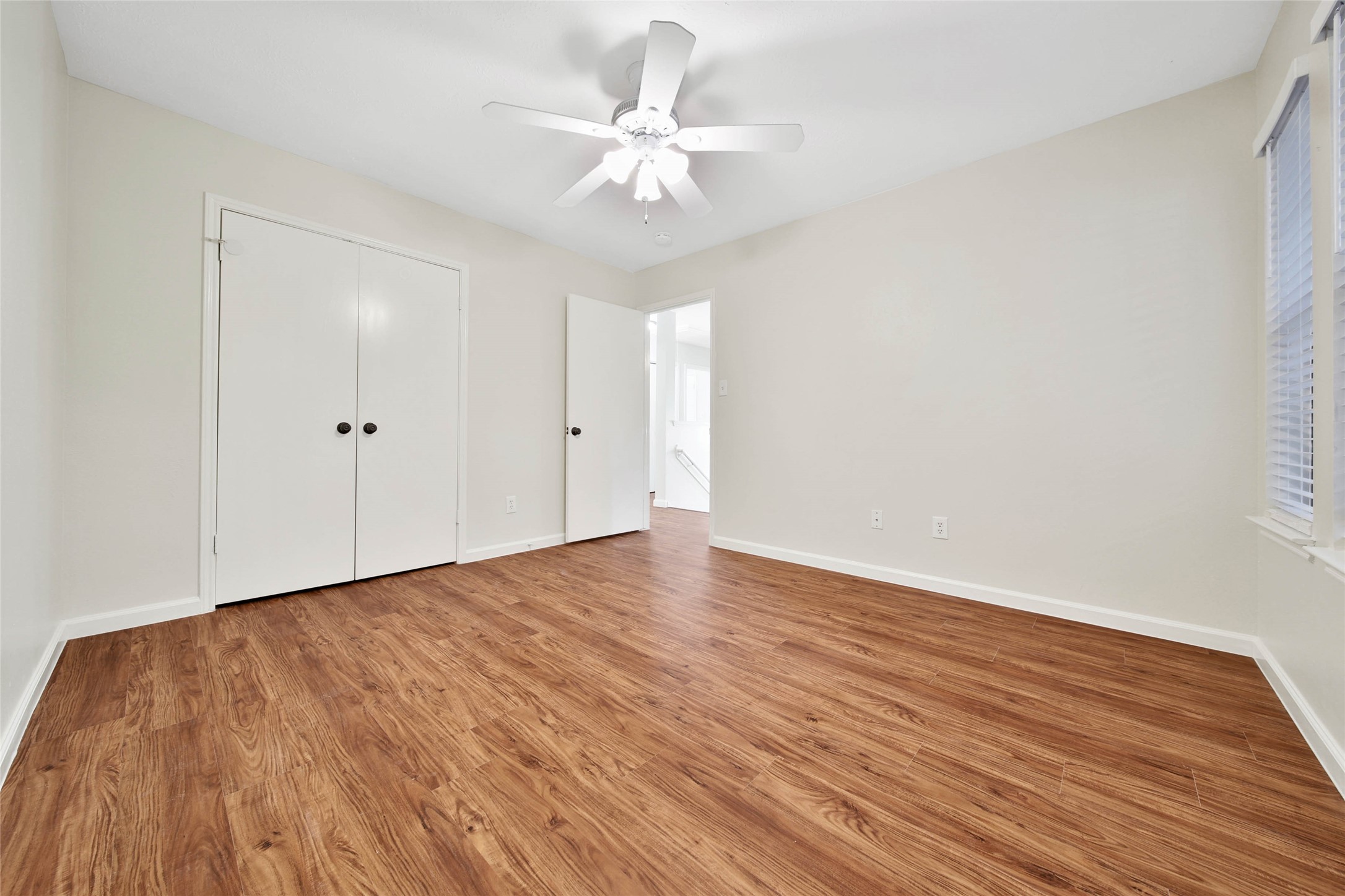 1427 Redwood Village Circle Spring, TX 77386 - Photo 40 of 43 a view of an empty room with wooden floor