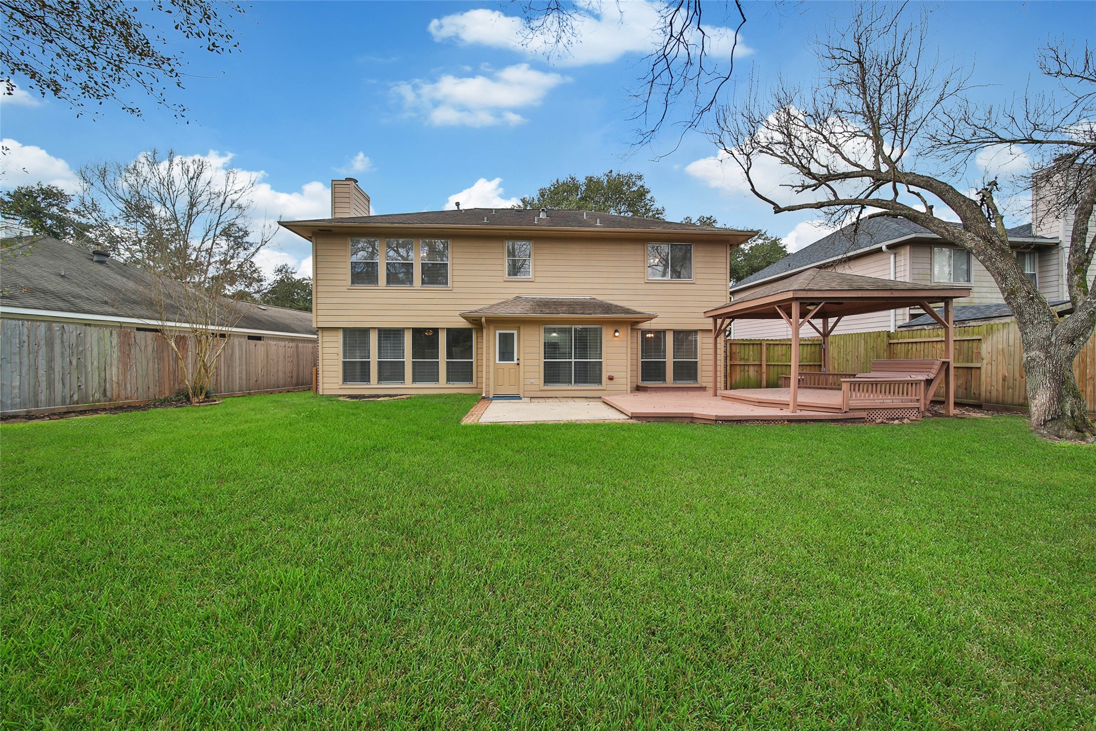 1427 Redwood Village Circle Spring, TX 77386 - Photo 7 of 43 a view of a house with a backyard