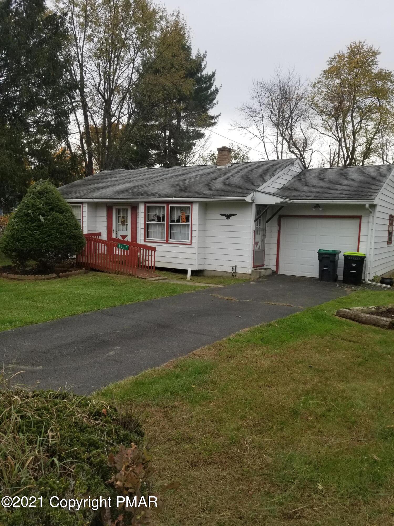 1111 Hillcrest Drive Stroudsburg, PA 18360 - Photo 2 of 20 a house view with a garden space