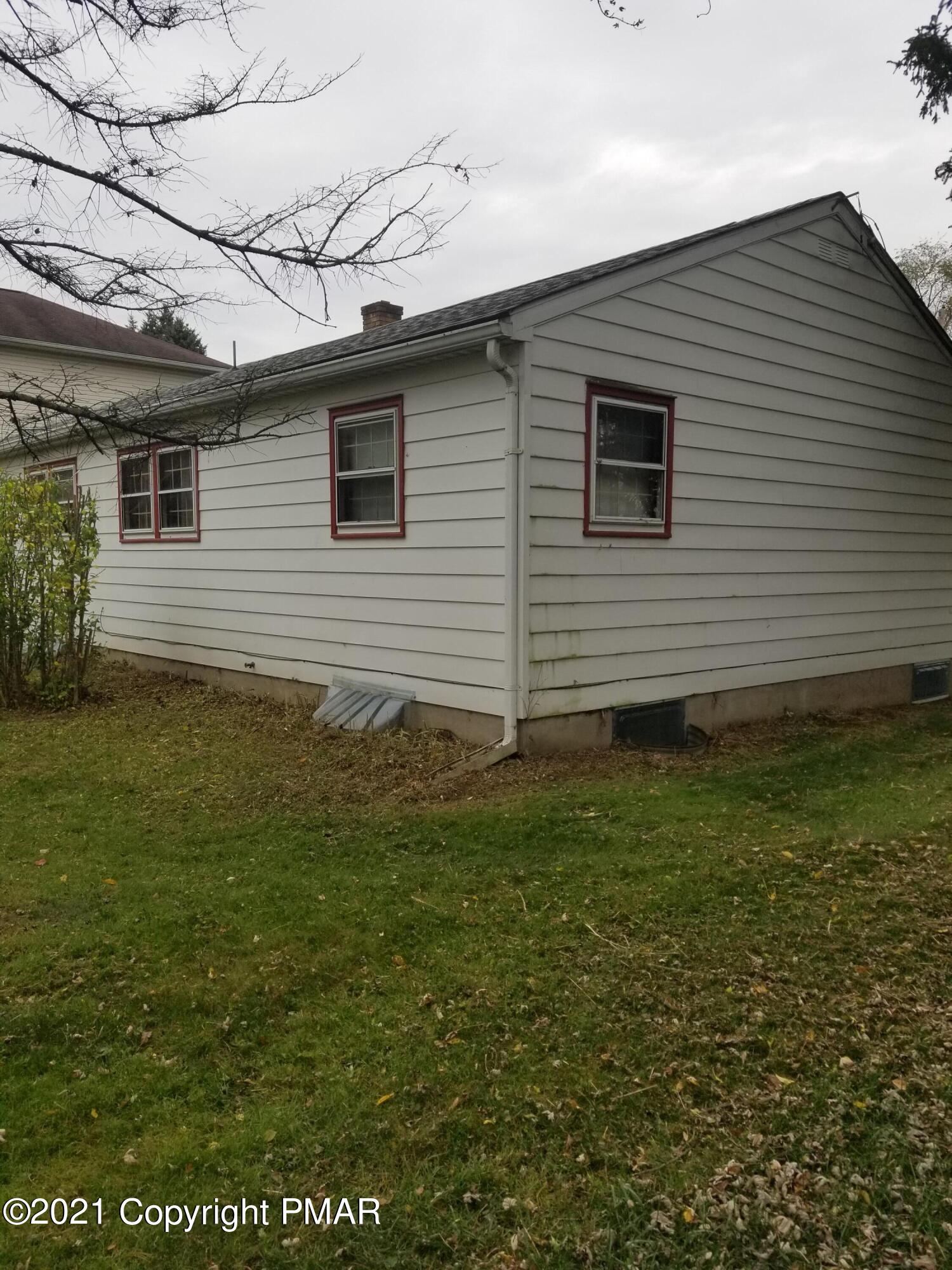 1111 Hillcrest Drive Stroudsburg, PA 18360 - Photo 6 of 20 a view of a backyard of the house