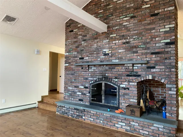 a living room with a fireplace