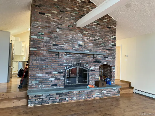 a living room with fireplace