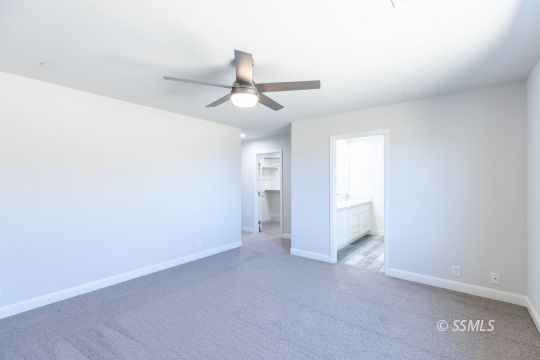 1012 Sims Street Ridgecrest, CA 93555 - Photo 28 of 36 a view of a livingroom with a ceiling fan and window