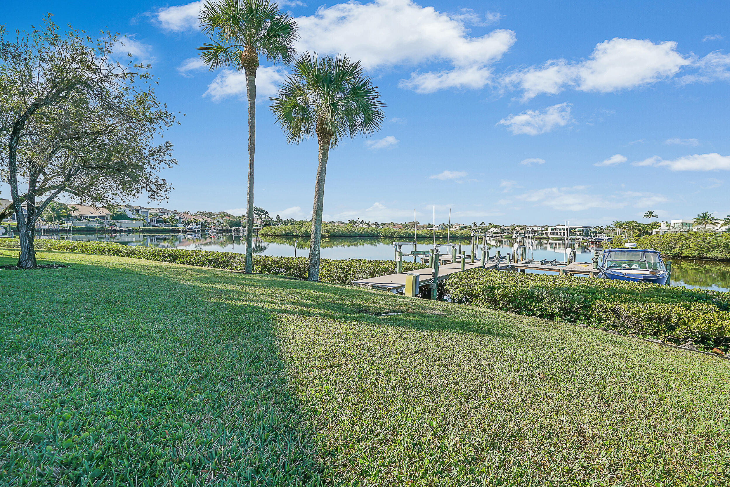 2703 Captains Way Jupiter, FL 33477 - Photo 34 of 57 a view of a garden and trees