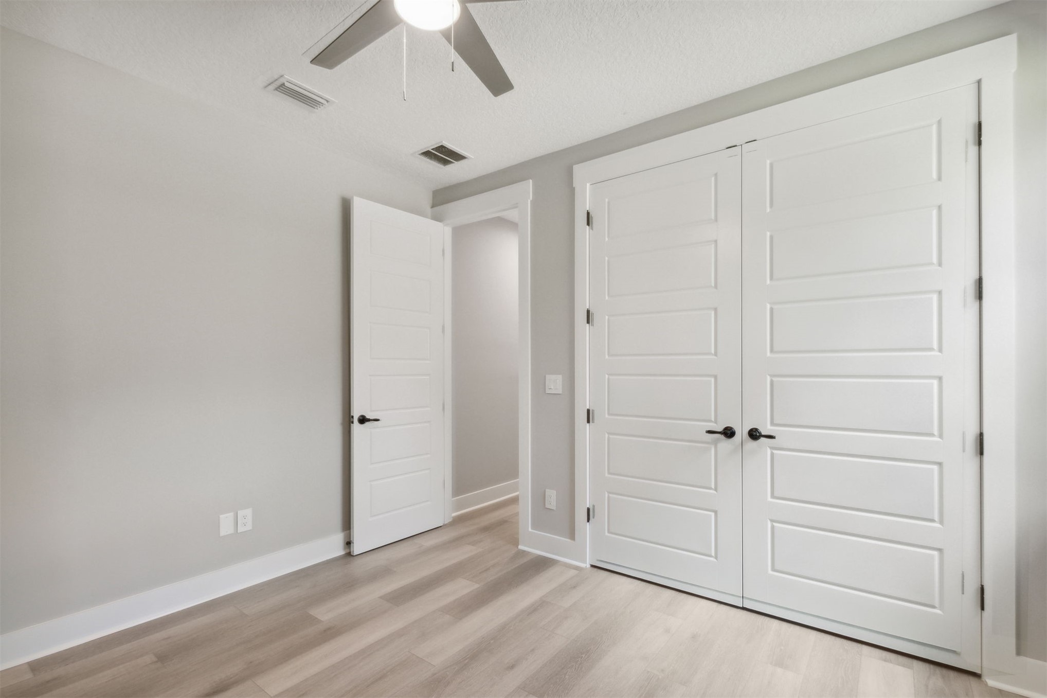 96050 Captains Pointe Road Yulee, FL 32097 - Photo 28 of 36 wooden floor in an empty room