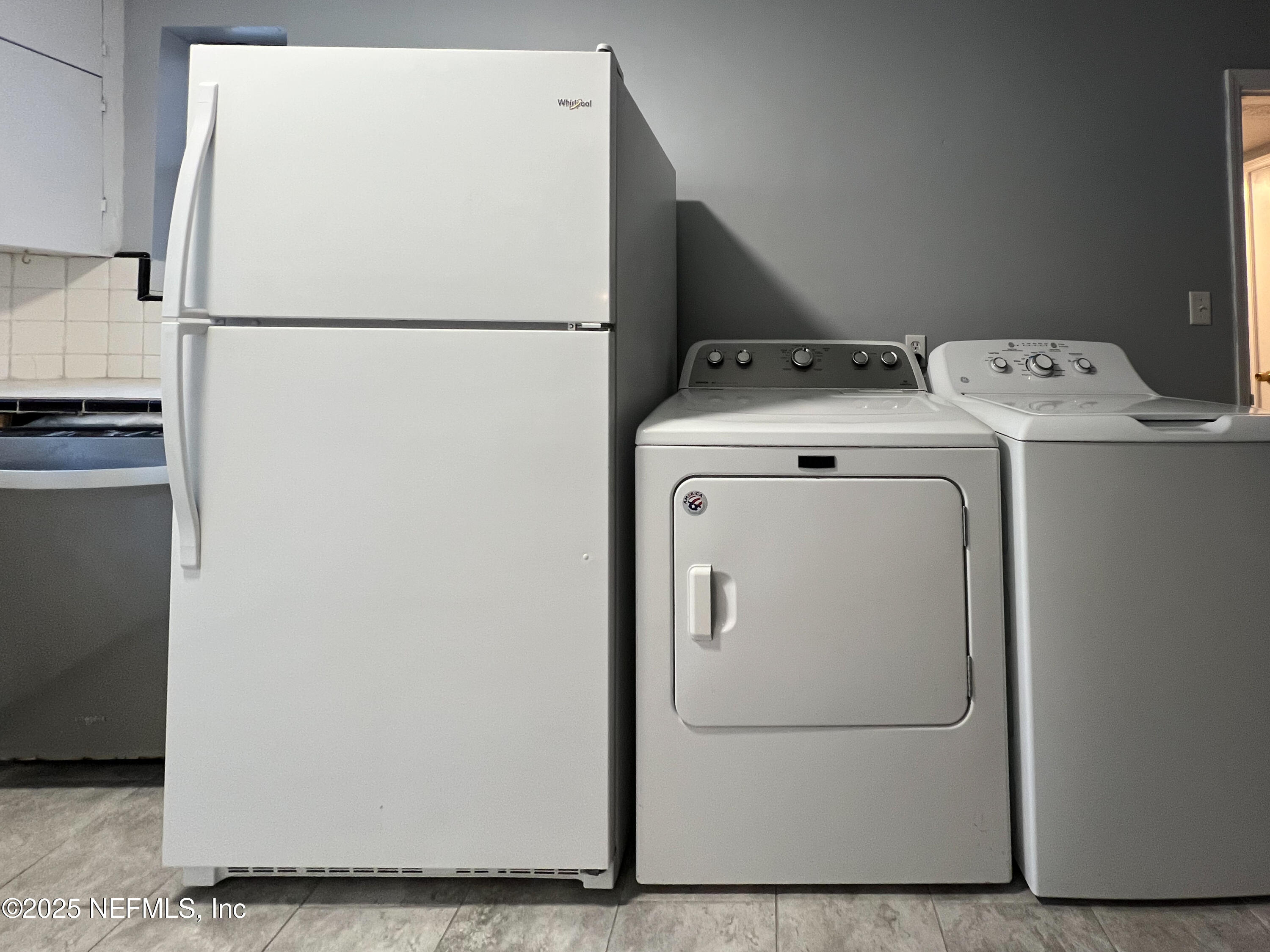 1733 River Road, Unit 1 Jacksonville, FL 32207 - Photo 8 of 16 a utility room with dryer and washer