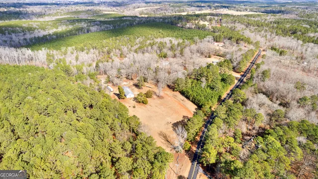 a view of a lake with a yard