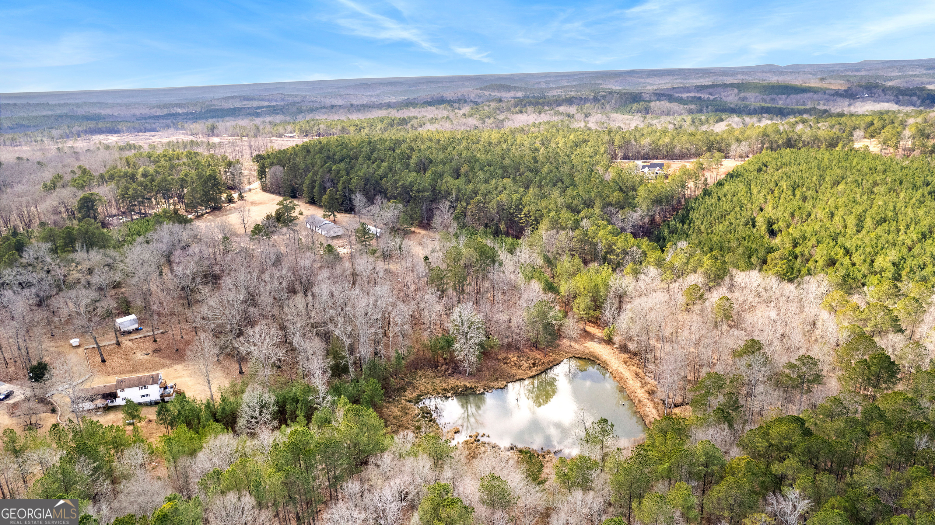 374 Gordon School Road Thomaston, GA 30286 - Photo 17 of 31 a view of a lake with a mountain