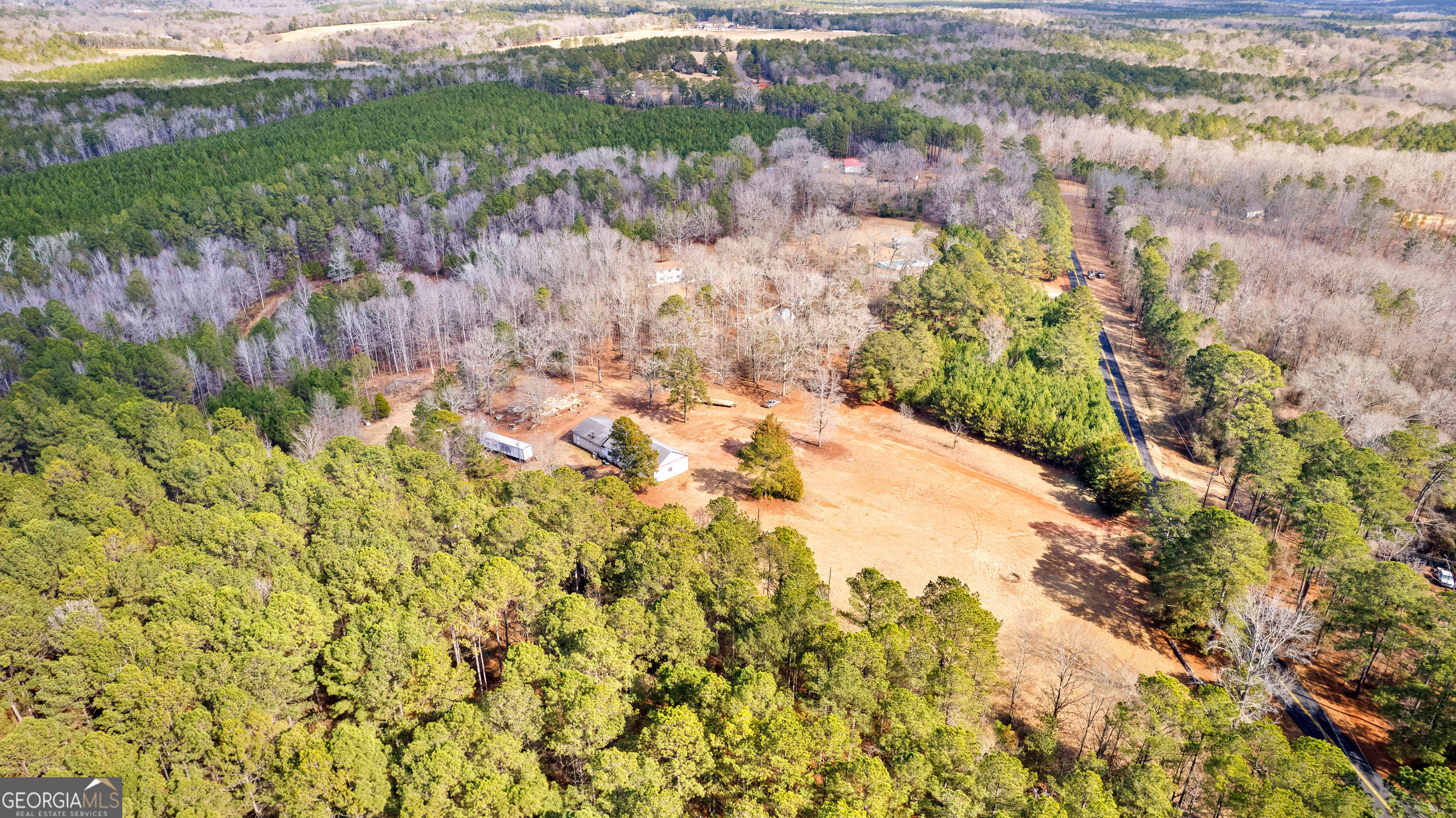 374 Gordon School Road Thomaston, GA 30286 - Photo 22 of 31 a view of a lake with a yard