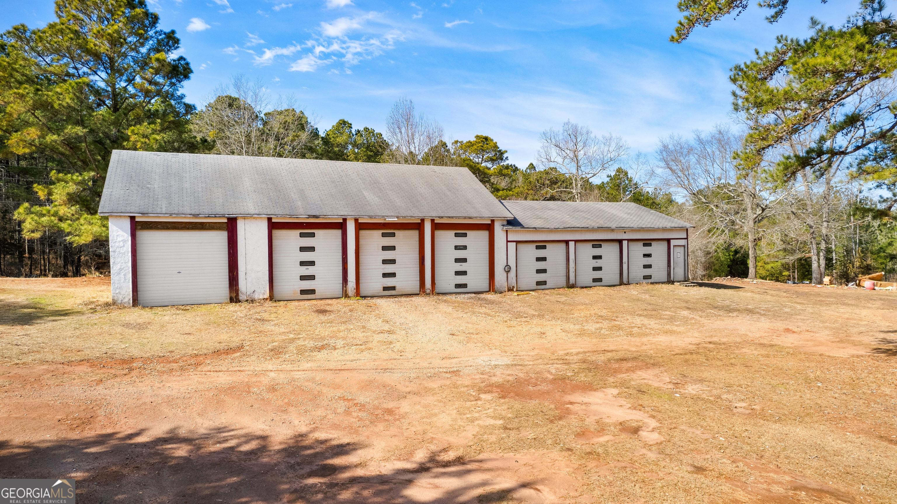 374 Gordon School Road Thomaston, GA 30286 - Photo 3 of 31 a front view of a house with a yard and garage
