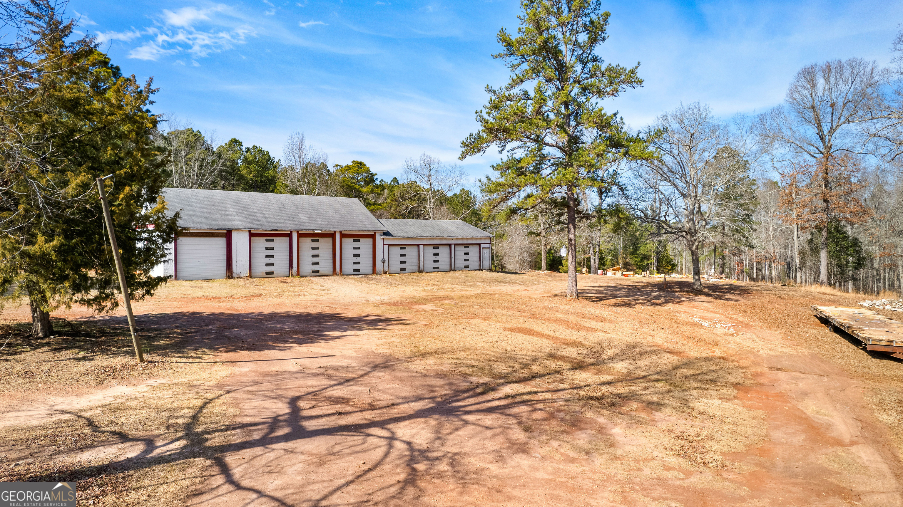 374 Gordon School Road Thomaston, GA 30286 - Photo 7 of 31 a street view with large trees