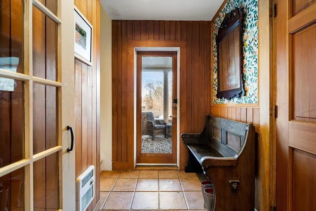 a view of an entryway with a front door