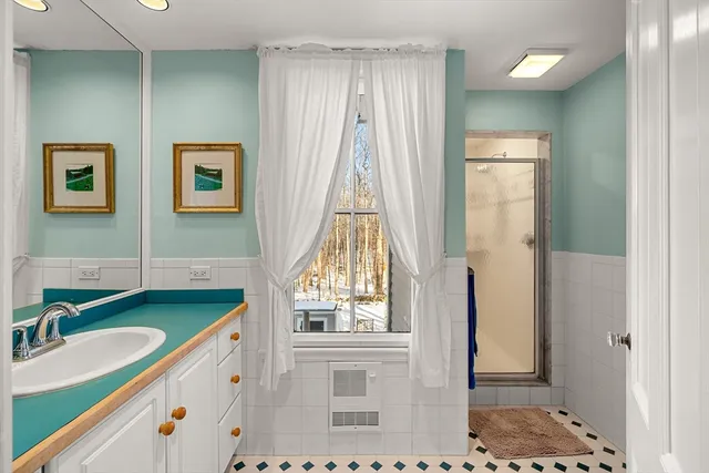 a kitchen with a sink and a refrigerator