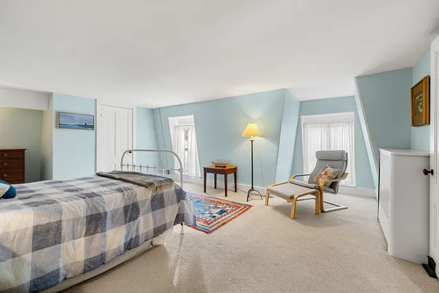 a view of an entryway with furniture and livingroom window