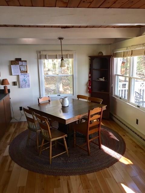 302 Timber Point Road Belgrade, ME 04917 - Photo 7 of 30 Dinning area with views of Long Pond.