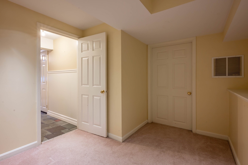12 Perley Road, Unit 5 Derry, NH 03038 - Photo 18 of 21 a view of an empty room