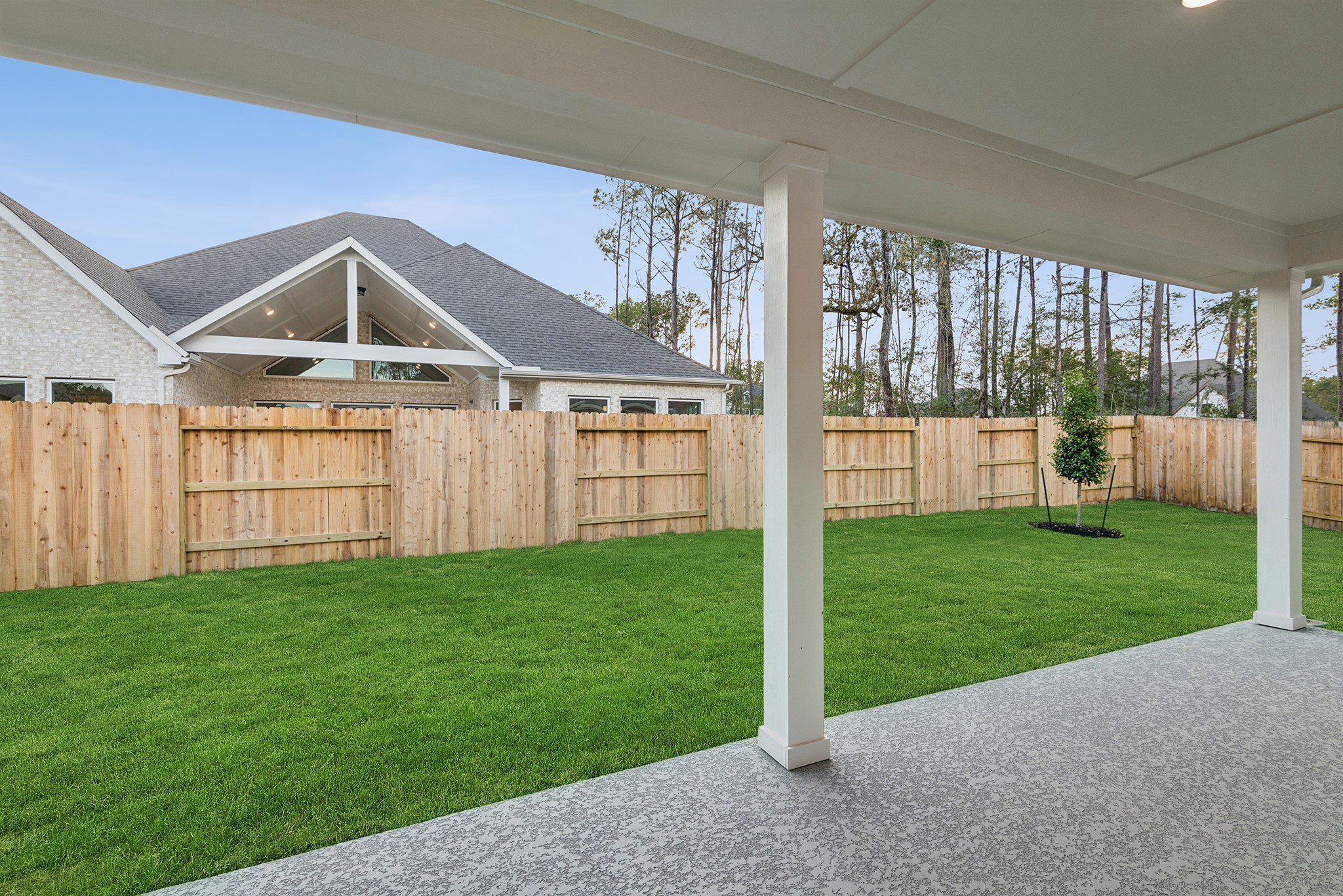 15714 Terracotta Terrace Lane Conroe, TX 77302 - Photo 7 of 47 a view of a house with a yard and porch