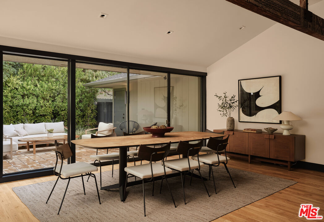 775 San Rafael Terrace Pasadena, CA 91105 - Photo 11 of 56 a view of a dining room with furniture window and outside view