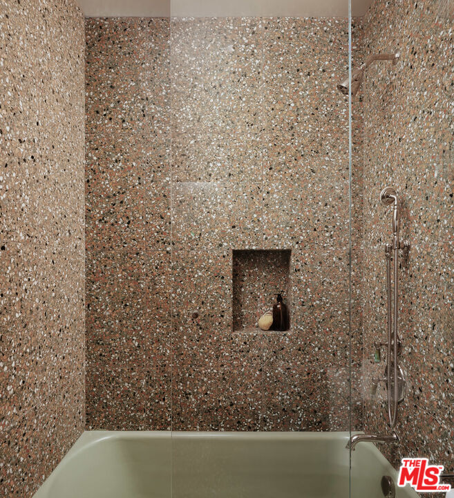 775 San Rafael Terrace Pasadena, CA 91105 - Photo 18 of 56 a bathroom with a shower and a sink