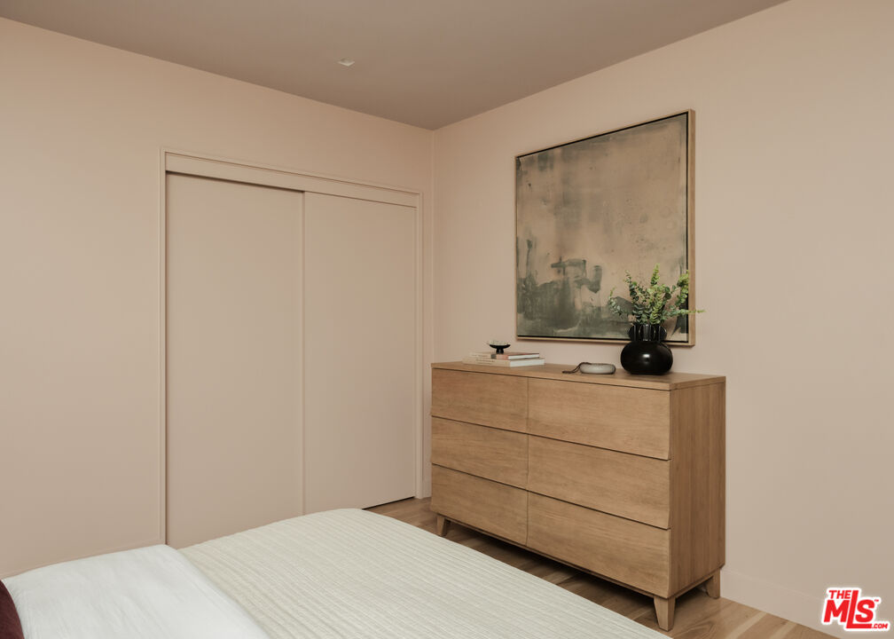 775 San Rafael Terrace Pasadena, CA 91105 - Photo 22 of 56 a room with a dresser