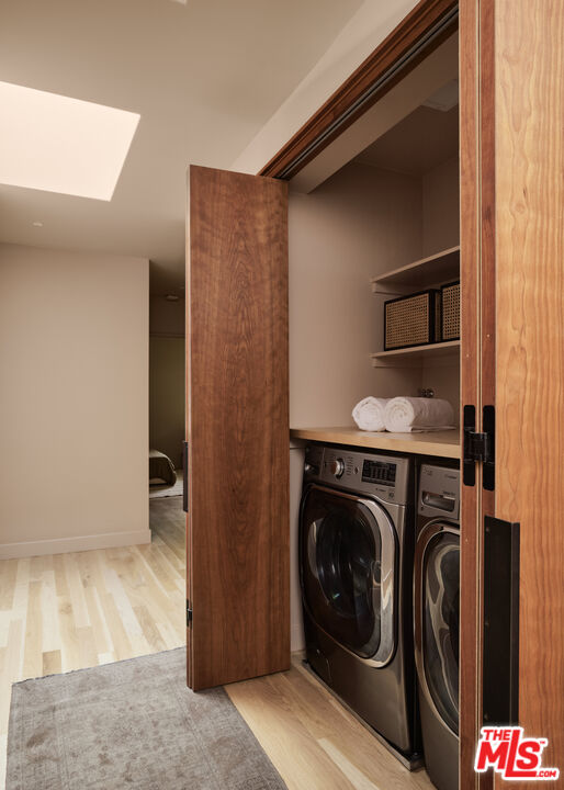 775 San Rafael Terrace Pasadena, CA 91105 - Photo 24 of 56 a utility room with dryer and washer