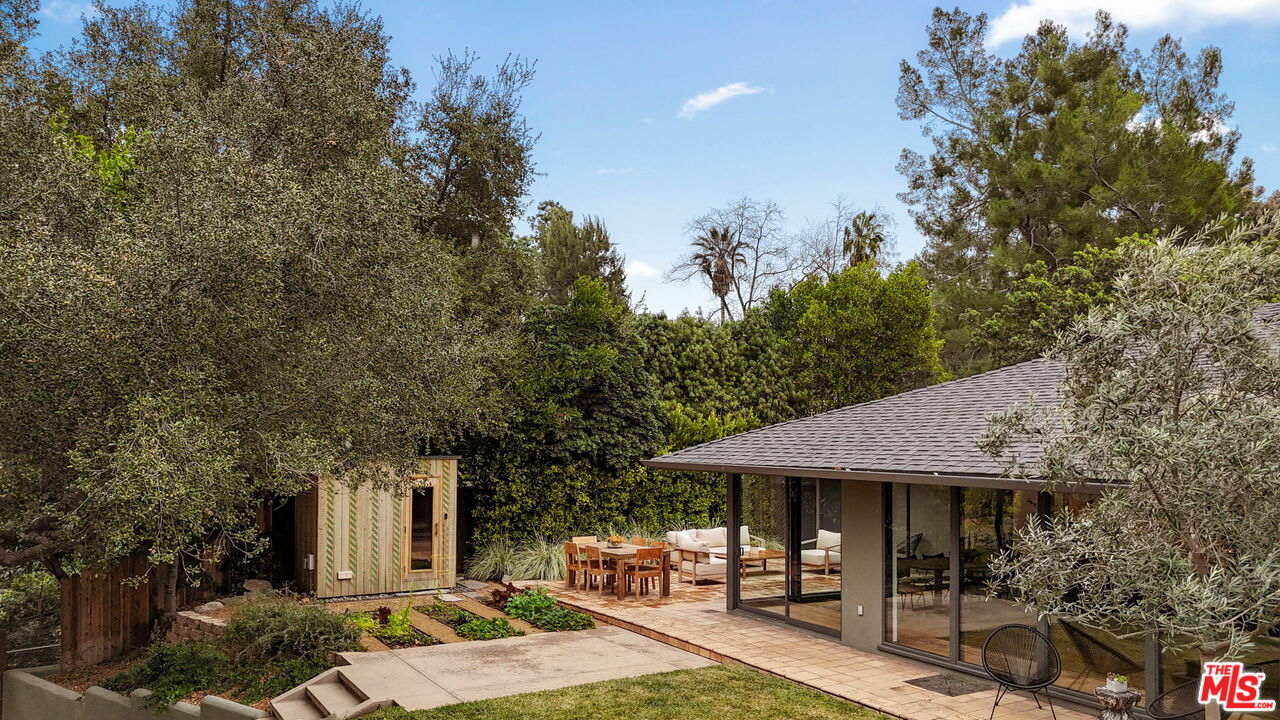 775 San Rafael Terrace Pasadena, CA 91105 - Photo 43 of 56 a patio with sofas fire pit table and chairs