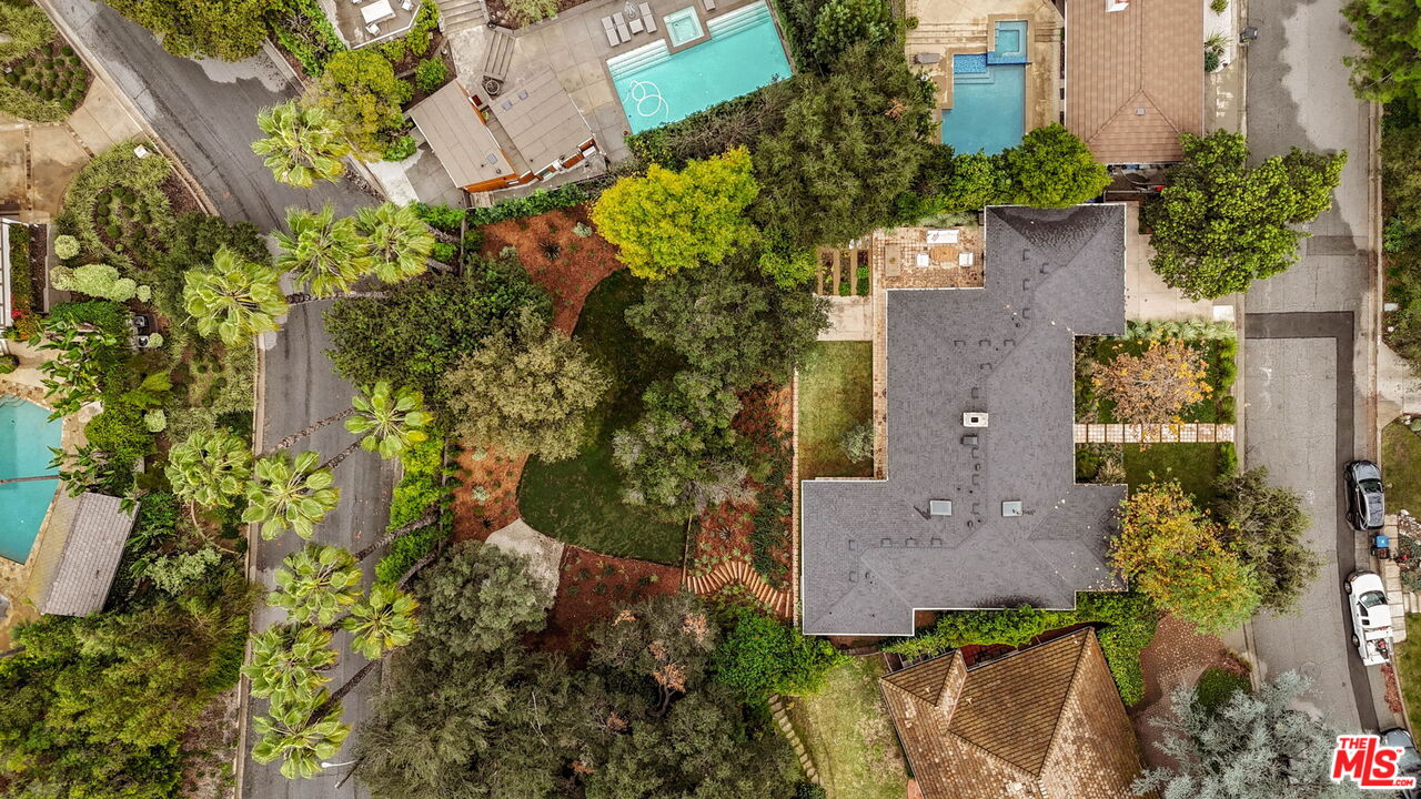775 San Rafael Terrace Pasadena, CA 91105 - Photo 53 of 56 an aerial view of a house with a yard and garden