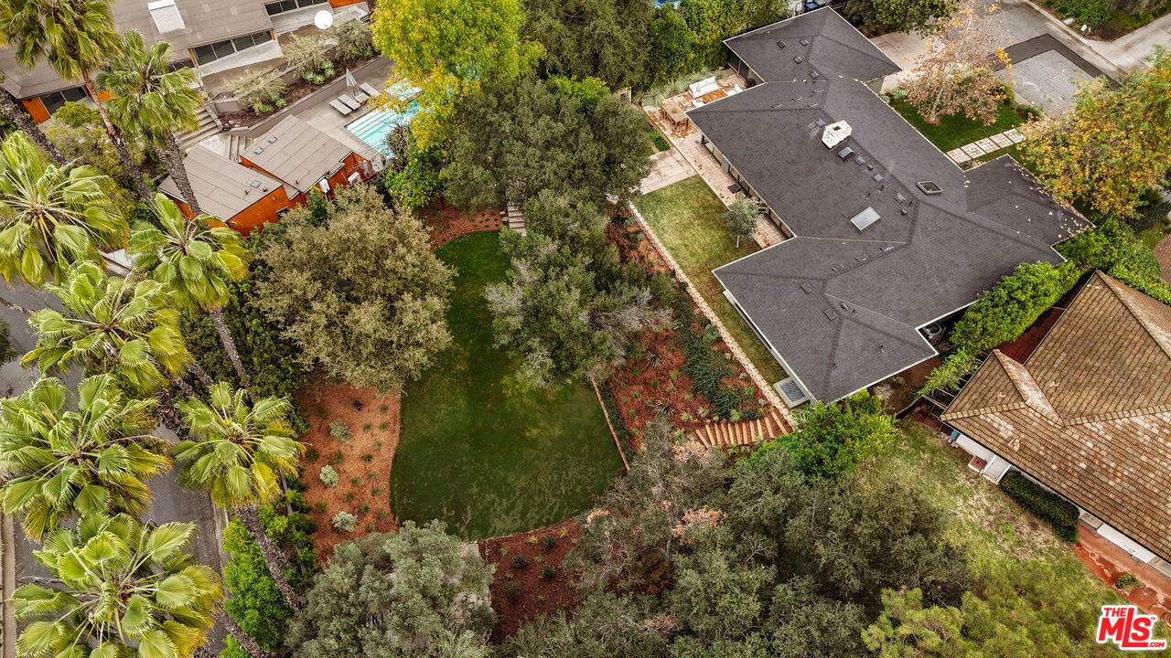 775 San Rafael Terrace Pasadena, CA 91105 - Photo 54 of 56 an aerial view of a house with a yard