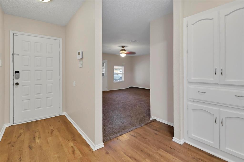 6632 Valley View Drive Watauga, TX 76148 - Photo 4 of 18 wooden floor in an empty room