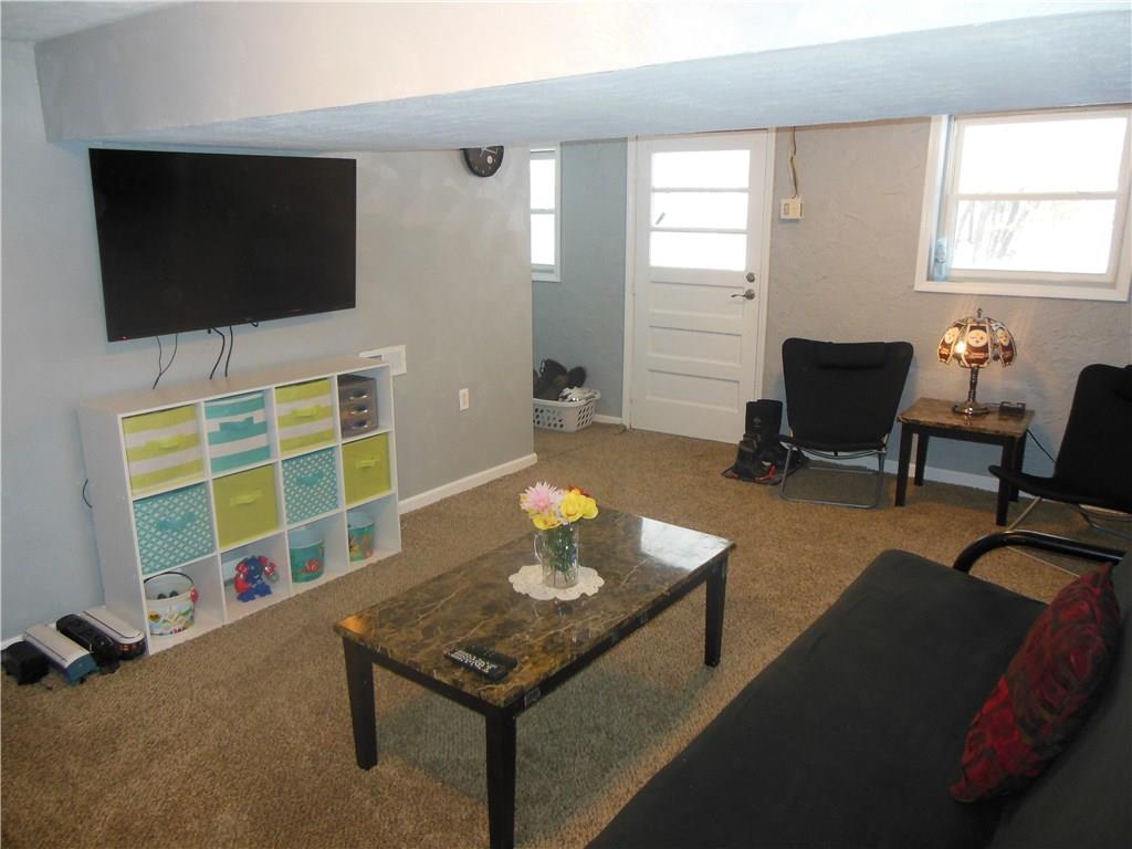 4145 Rte 908 Natrona Heights, PA 15065 - Photo 20 of 25 Could be used as a den or extra living space! Door leads to the backyard