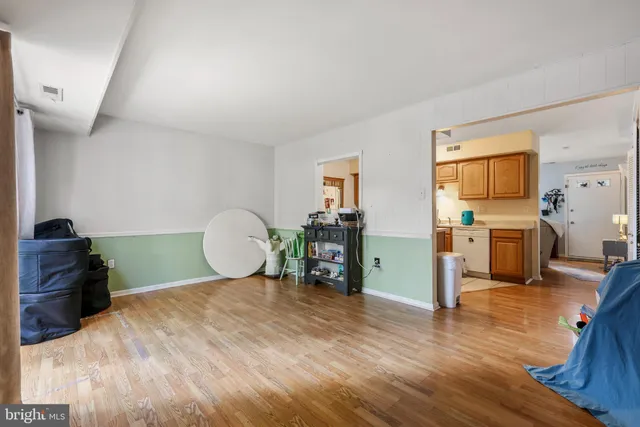 a bed room with a bed and dresser