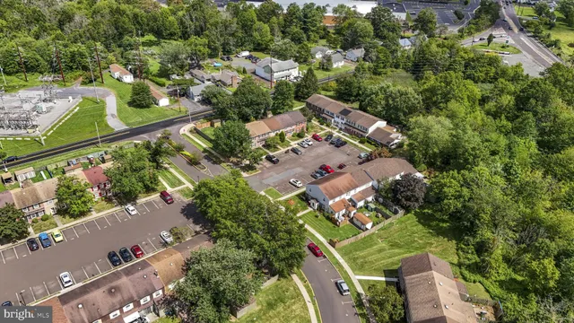 an aerial view of a house with outdoor space