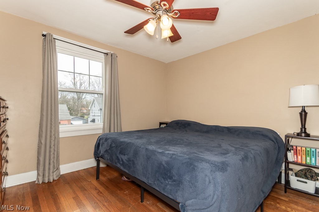 4494 Telhurst Road Cleveland, OH 44121 - Photo 13 of 31 Owners bedroom with hardwood floors and ceiling fan. The current bed is a king size so it is spacious!