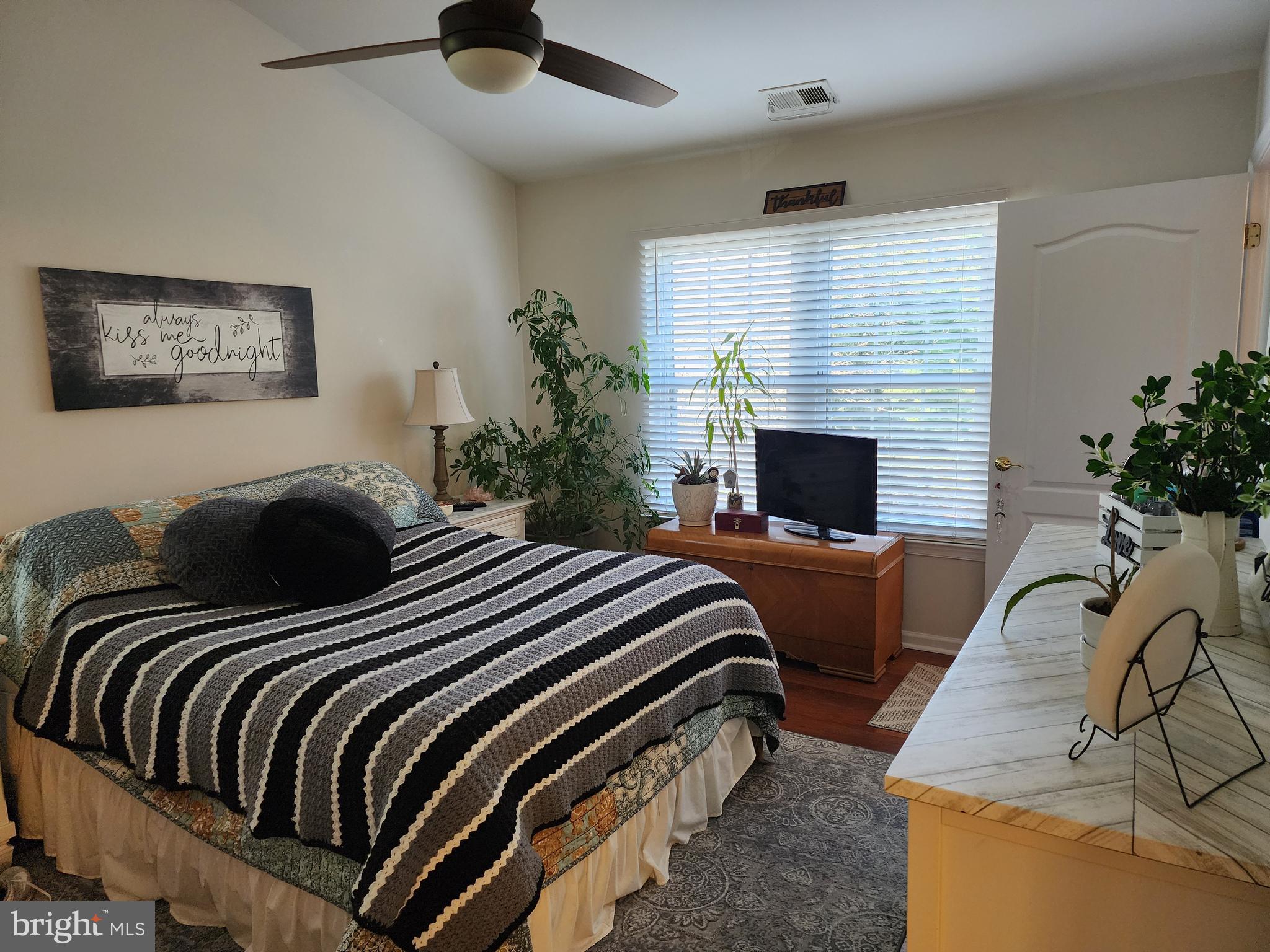 132 Mowat Circle Hamilton, NJ 08690 - Photo 10 of 16 a bedroom with bed and a fireplace